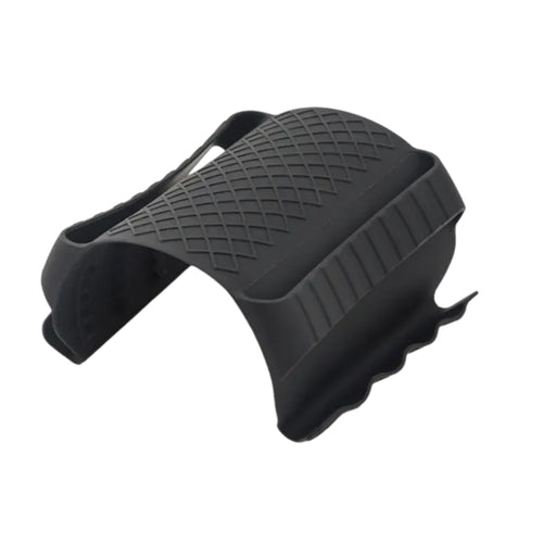 Black Multi-Functional Silicone Anti-Skid Heat Insulation Clip Guard with a ribbed gripping surface and a textured underside, designed for safely lifting hot cookware lids or handling heated trays. Its durable, heat-resistant silicone build provides a secure, non-slip grip—perfect for stovetop, microwave, or oven use. Shown resting on a light-colored kitchen towel for contrast and clarity -1598452898401 13017586.