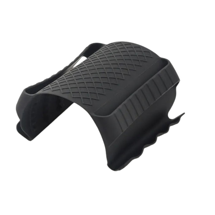 Black Multi-Functional Silicone Anti-Skid Heat Insulation Clip Guard with a ribbed gripping surface and a textured underside, designed for safely lifting hot cookware lids or handling heated trays. Its durable, heat-resistant silicone build provides a secure, non-slip grip—perfect for stovetop, microwave, or oven use. Shown resting on a light-colored kitchen towel for contrast and clarity -1598452898401 13017586.