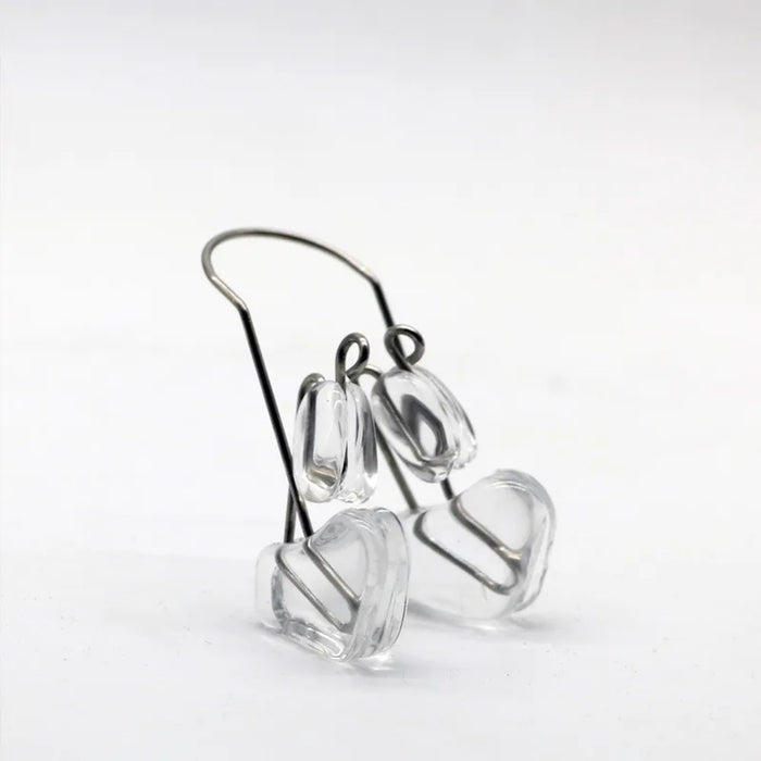 Nose Bridge Lifter – Non-Surgical Shaping Clip, Comfortable Fit, transparent geometric earrings shown for aesthetic reference