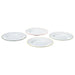 IKEA UPPLAGA side plates in white with scalloped edges and pastel rims in green, pink, yellow, and mint