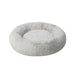UTSÅDD pet bed, light grey, M – round shape with raised cushioned edge and plush faux fur surface. Creates a calming, cozy space for medium-sized pets – 70570582.