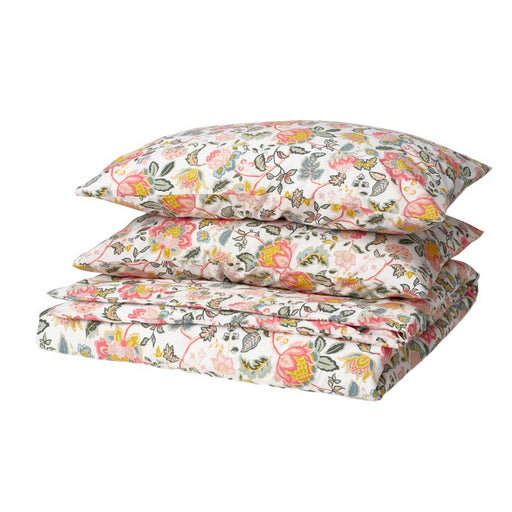 Floral bedding set with a pillow and duvet on a white background