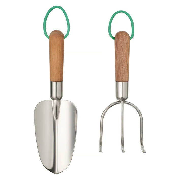 Two-piece gardening set with stainless steel hand trowel and cultivator, each with ergonomic birch wood handles and green hanging loops, designed for planting and soil care.
