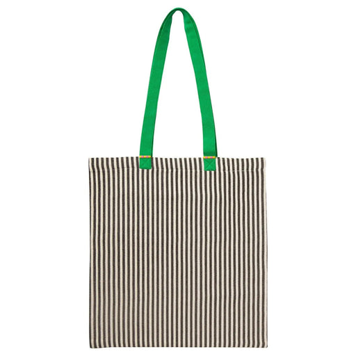 IKEA MÄVINN tote bag with vertical black-and-white stripes and vibrant green handles, accented with red and yellow stitch details