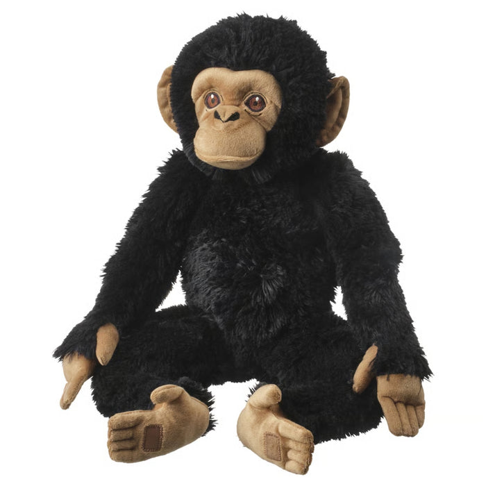 IKEA SANDLÖPARE soft toy chimpanzee in black with beige face, ears, hands, and feet, shown seated against white background