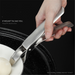 Top view of stainless steel bowl lifter tool with ergonomic handle