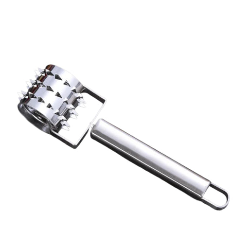 Metallic garlic press on a white background
