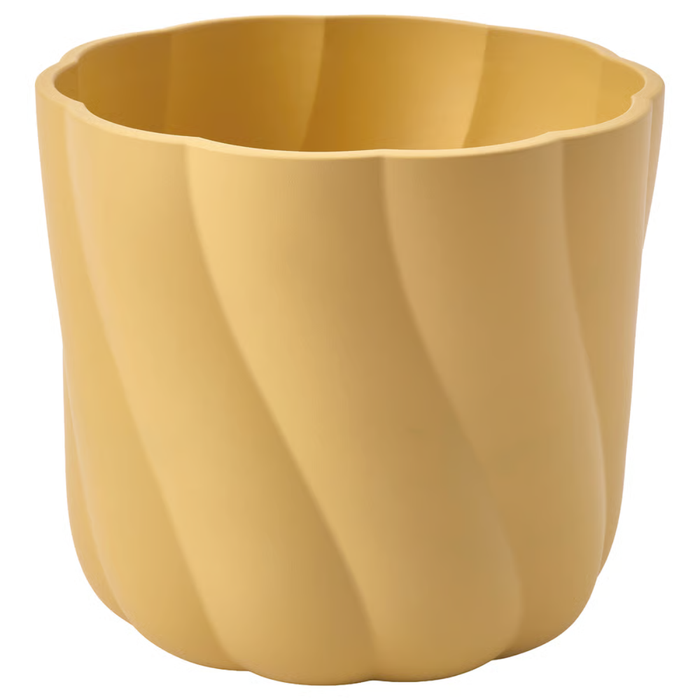 Dark yellow plastic plant pot with scalloped rim and twisted vertical design, 12 cm diameter.