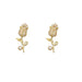 Gold floral earrings with pearl centers on a white background