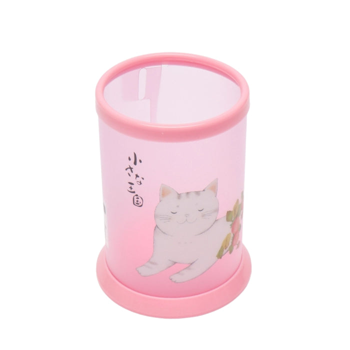 Pink pen holder with a cat illustration on a white background