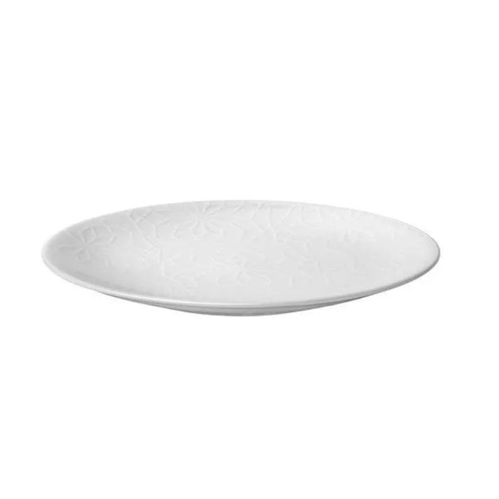 White ceramic plate on a white background