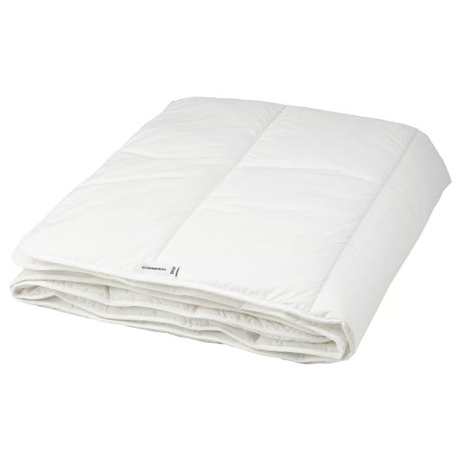 IKEA STJÄRNBRÄCKA warm white duvet, 150x200 cm, neatly folded with visible product label on edge; soft and cozy bedding for restful sleep – 00458089