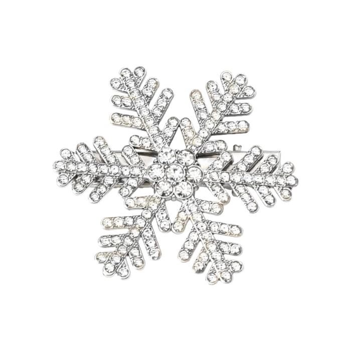 Crystal snowflake brooch – silver-toned pin with rhinestone branches and pearl center for festive styling