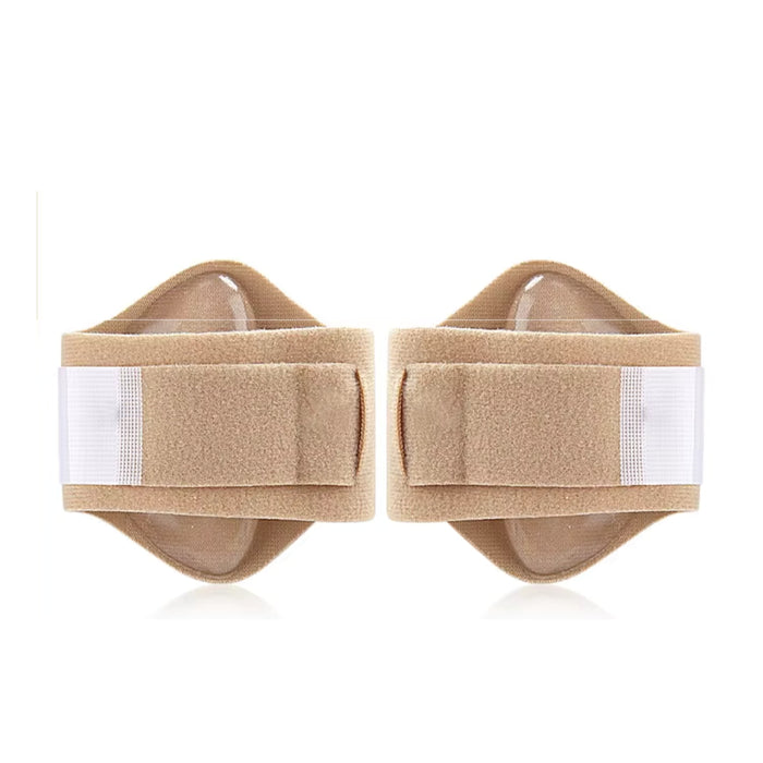 Pair of beige knee braces with white straps on a white background