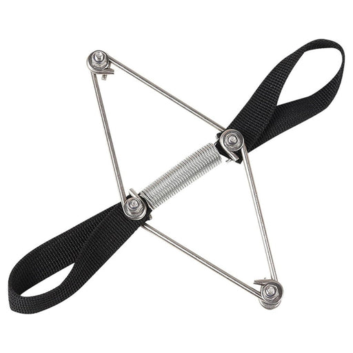 Close-up of a stainless steel elastic toe tension band with black adjustable fabric straps for bunion correction.