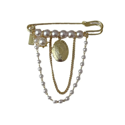 Retro Pearl Tassel Brooch – Gold Safety Pin, Personalized Vintage Charm, displayed with pearl strands and oval locket