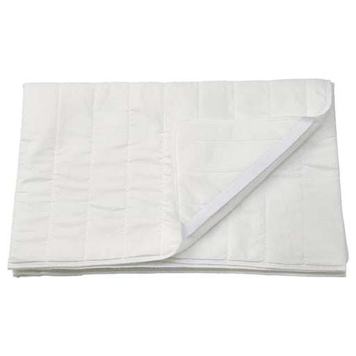 White quilted cover on a white background