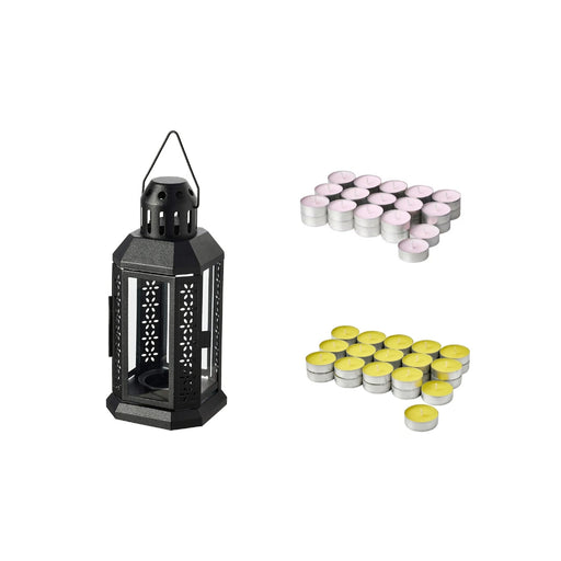 Black metal lantern with tealight candles on a white background