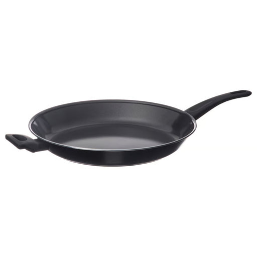 Black frying pan on a white background