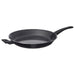 Black frying pan on a white background