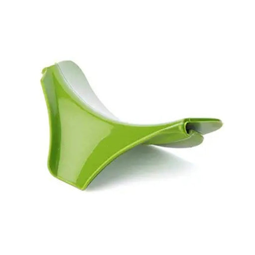 Green and white kitchen tool on a white background