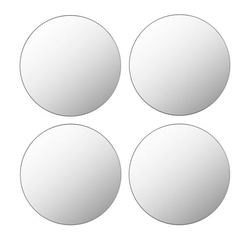 Four white round objects on a white background