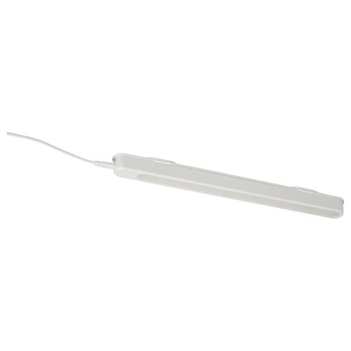 Slim and modern IKEA ROLFSTORP white LED lighting bar with a power cord connection.