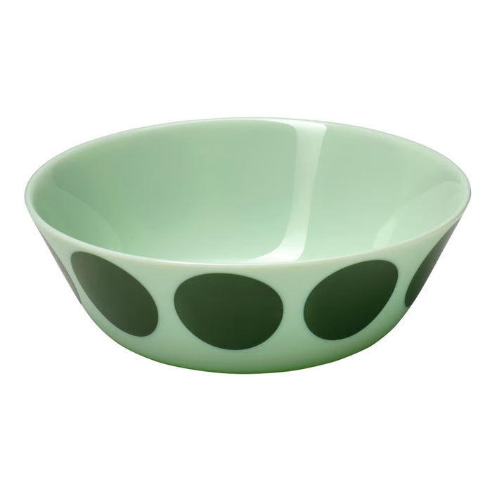 Green bowl with black polka dots on a white background