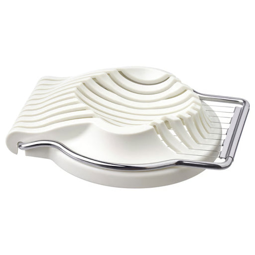 IKEA UPPFYLLD Egg slicer, off-white, featuring a curved plastic base with sturdy stainless steel cutting wires. The ergonomic design ensures precise, uniform slices for hard-boiled eggs, making it an essential kitchen tool for salads, sandwiches, and meal prep.-40605125