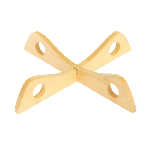Insulated cross-shaped bamboo mat featuring four curved slats intersecting at the center to form an “X” layout—each slat includes a circular cutout near the edge, likely for weight reduction and aesthetic appeal; natural bamboo texture provides a heat-resistant surface for safely placing hot pots or pans on tables and countertops – 562152 12826862.