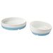Two white bowls with blue bottoms on a white background