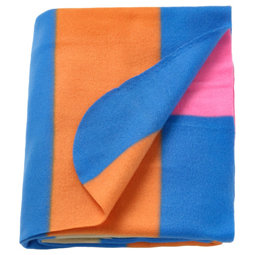 Folded fabric with blue and orange pattern on a white background