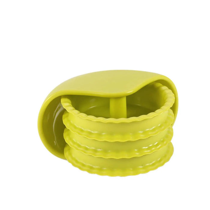 Set of yellow silicone coasters with a holder on a white background