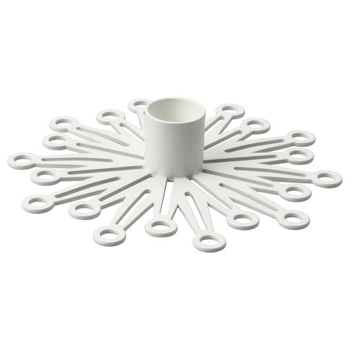 IKEA FRÖJDA candlestick in white with snowflake-inspired radial arms and circular cutouts, designed to hold slim candles