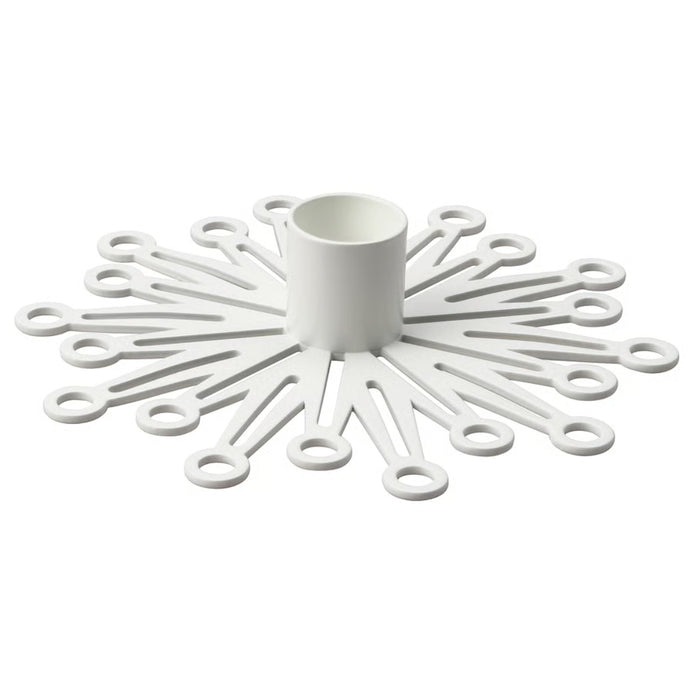 IKEA FRÖJDA candlestick in white with snowflake-inspired radial arms and circular cutouts, designed to hold slim candles