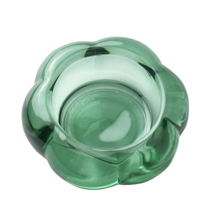 Green glass knob on a white background