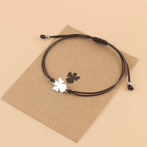 Couple Angel Bracelet – Adjustable Wax Cord, Stainless Steel Charm, displayed on brown card with butterfly silhouette

