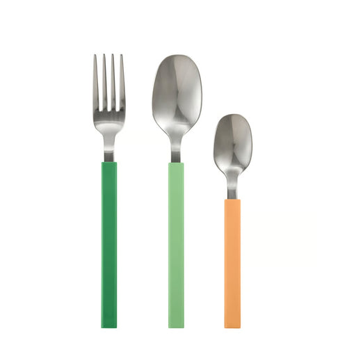 Set of three silver cutlery items with colored handles on a white background