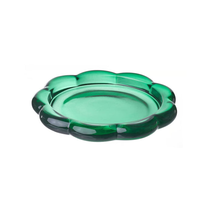 Green glass ashtray on a white background