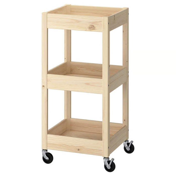 IKEA LOSHULT trolley in pine wood, three-tier design with raised edges and four black caster wheels, shown against white background