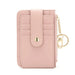 Pink wallet with a keychain on a white background
