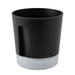 Close-up of IKEA VÅRDTRÄD self-watering plant pot in transparent and anthracite color, 12 cm diameter