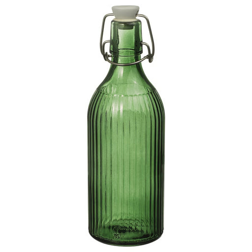 Green glass bottle with a white cap on a white background