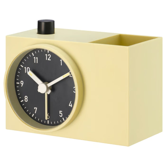 Yellow clock with black face on a white background