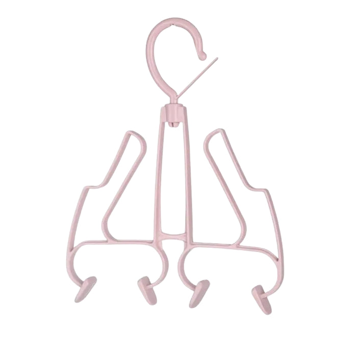 Pink metal hanger with multiple hooks on a white background