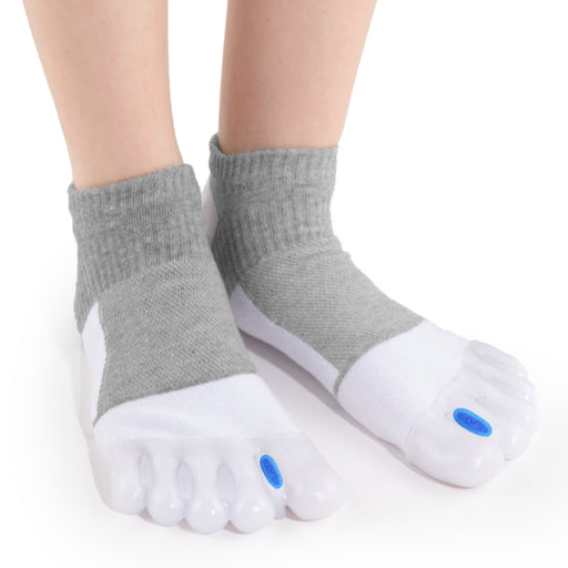 Pair of grey bunion corrector sleeves featuring an orthopedic toe alignment splint and soft fabric for pain relief.