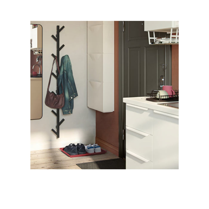 BAGGMUCK shoe mat in red with shoes placed on top