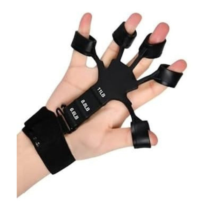 Black finger exerciser on a hand against a white background