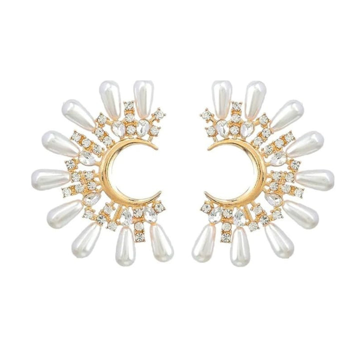 Digital Shoppy moon pearl earrings – crescent-shaped gold base with white teardrop pearls and zircon sunburst accents

