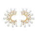 Digital Shoppy moon pearl earrings – crescent-shaped gold base with white teardrop pearls and zircon sunburst accents


